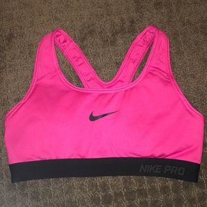 Pink and black sports bra size medium